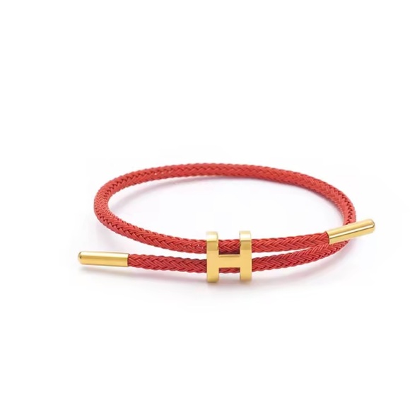 Adjustable wire bracket 
Red and Gold Braided Bracelet - Picture 1 of 10